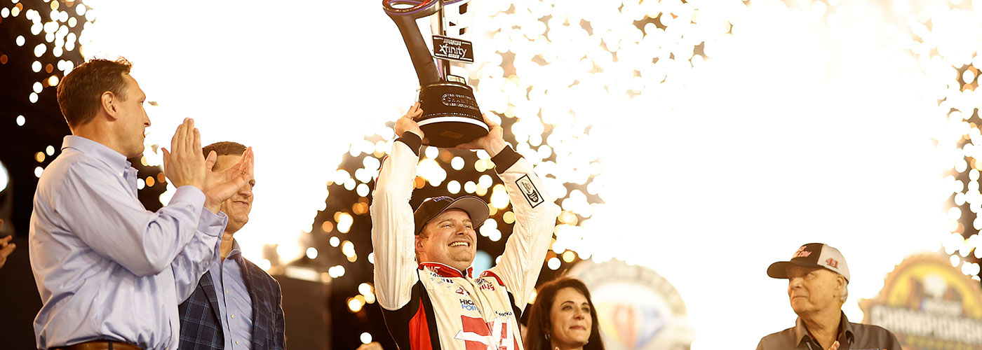 Cole Custer, driver of the #00 Haas Automation Ford, celebrates in victory lane after winning the NASCAR Xfinity Series Championship at Phoenix Raceway on November 04, 2023 in Avondale, Arizona. (Photo by James Gilbert/Getty Images)