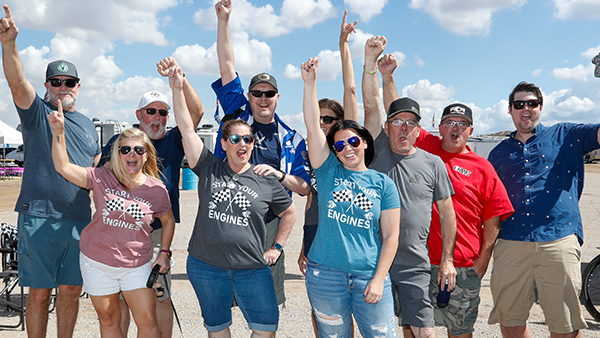 Fans cheering at Tailgate